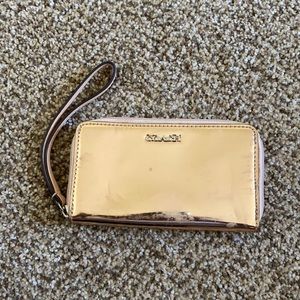 Coach gold wristlet